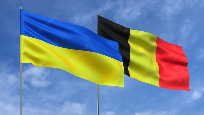 flags-ukraine-belgium-flagpoles-center-flags-sky-background-place-text-ukrainian-belgian-3d-illustration_630687-1862-Cropped.jpg